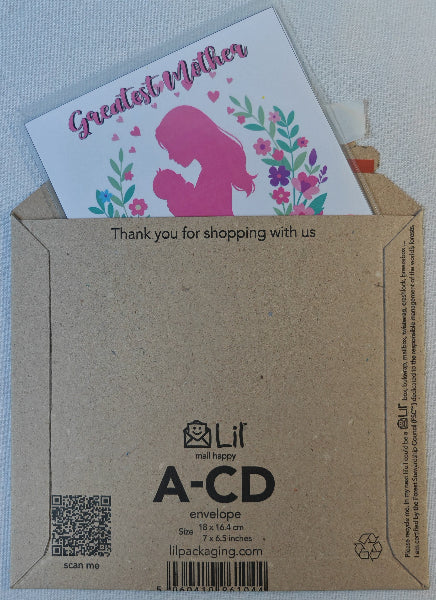 Card with pink silhouette and floral design in a brown envelope with Lil' mail happy branding.