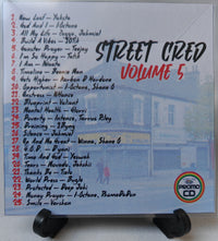 Thumbnail for CD cover for 'Street Cred Volume 5' with tracklist and building image.