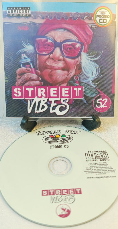 CD cover with a person holding a microphone and 'Street Vibes' text, featuring Reggae Nest branding.