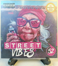 Thumbnail for Promotional CD cover with an elderly person holding a can, titled 'Street Vibes', on a stand.