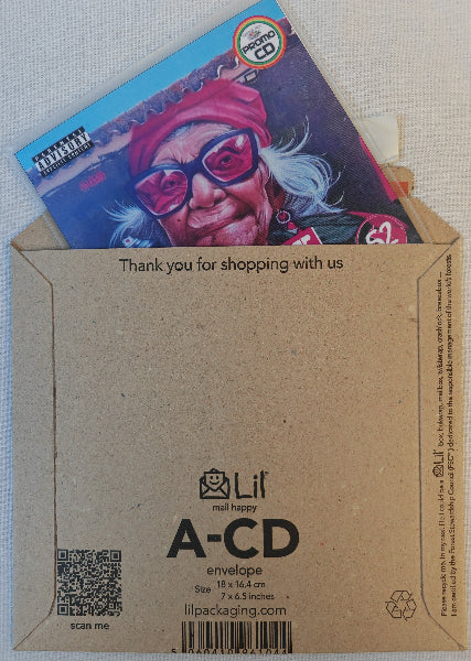 Cardboard envelope with a colorful card featuring a person wearing glasses and a pink headband, with 'Lil' branding visible.