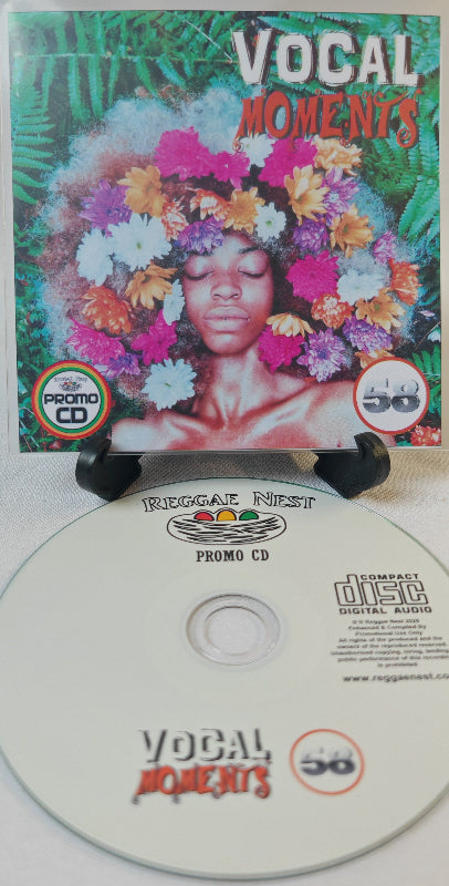Promo CD with a colorful cover featuring a woman with flowers in her hair, displayed on a stand.