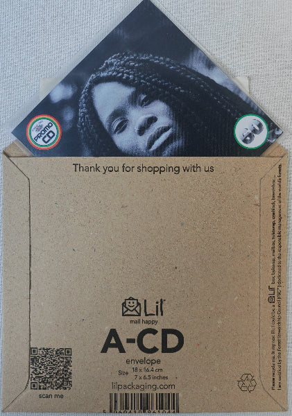 Cardboard envelope with a photo of a person and text, featuring the brand 'Lil'.