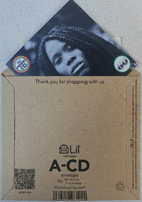 Thumbnail for Cardboard envelope with a photo of a person and text, featuring the brand 'Lil'.