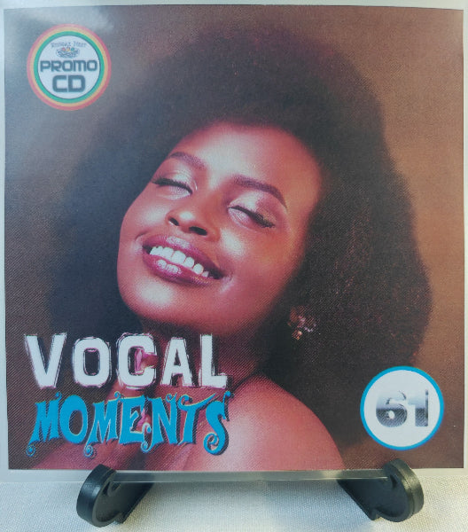 Promo CD cover with a woman's face and 'Vocal Moments' text on a brown background